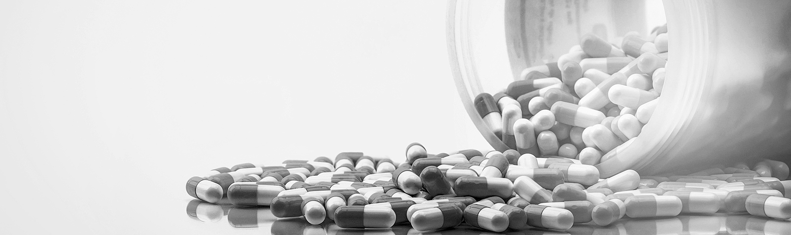 bigstock-Blue-And-White-Capsules